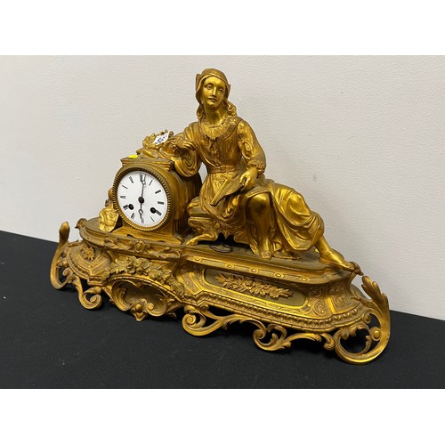 567 - Gilt clock with figure on stand with key