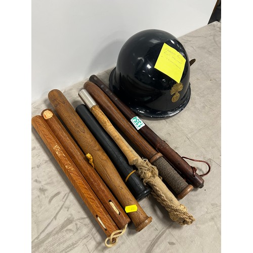 collection of early 20th c Truncheons + French police riot Helmet