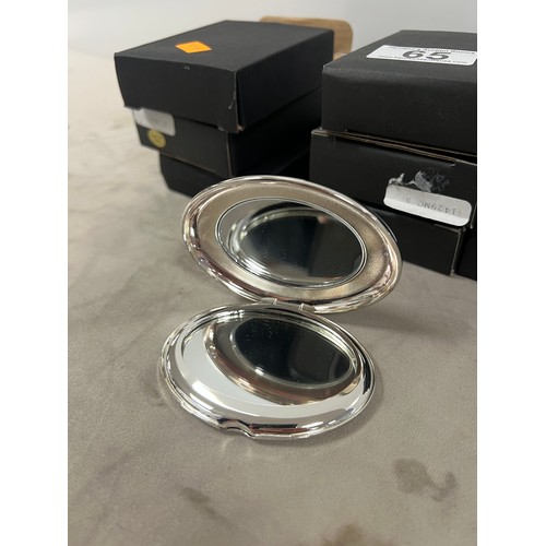 65 - Collection boxed plated mirror