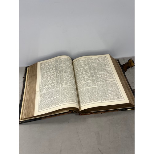 105 - Family bible with coloured photo's