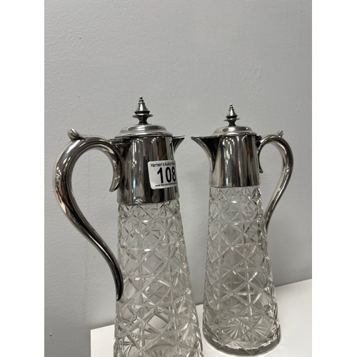 108 - Pair vintage claret jugs with pewter tops