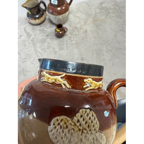 45 - Early 20th century Doulton Lambeth silver topped jug + 3 jugs