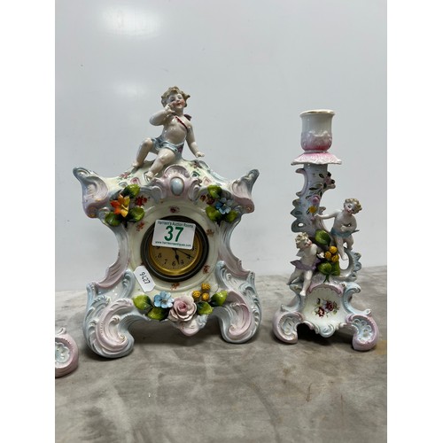 37 - Early 20th century Ornate cherub clock garniture possibly Meissen