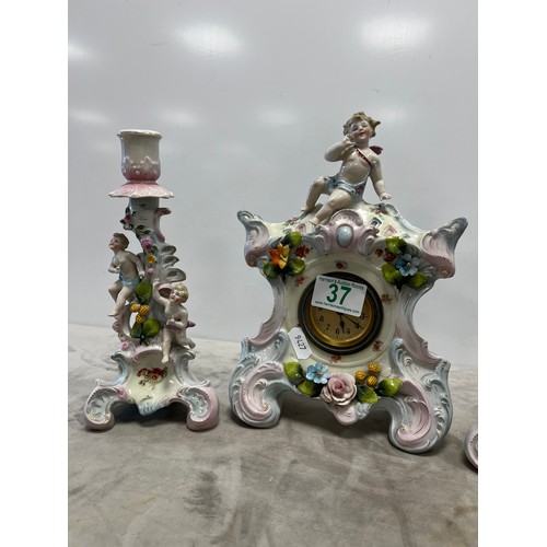 37 - Early 20th century Ornate cherub clock garniture possibly Meissen