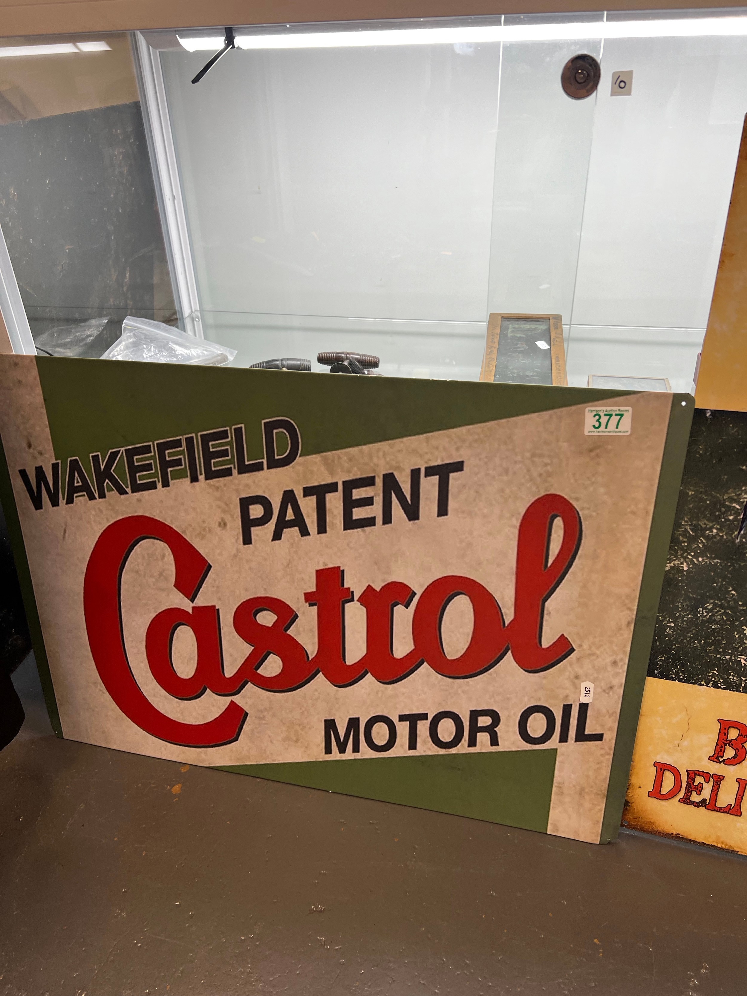 2 advertising tin signs, Castrol and the rooster