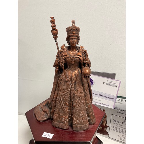 44 - Danbury Mint “ Queen Elizabeth ll” Memorial sculpture bronze effect on wooden plinth Set with coins