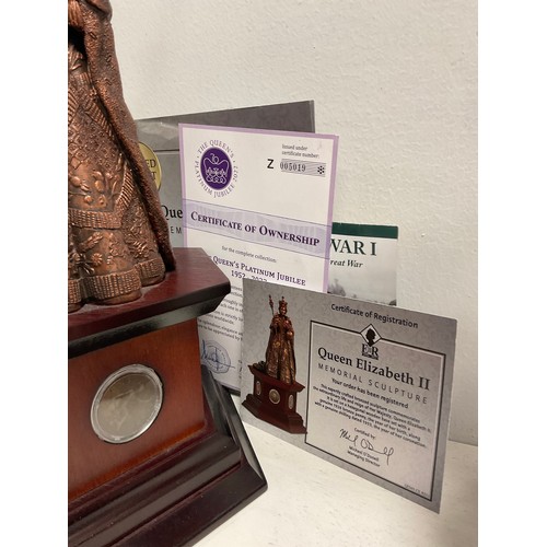 44 - Danbury Mint “ Queen Elizabeth ll” Memorial sculpture bronze effect on wooden plinth Set with coins