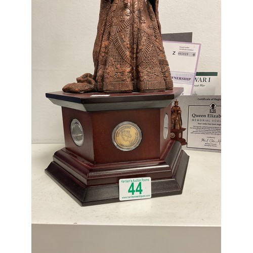 44 - Danbury Mint “ Queen Elizabeth ll” Memorial sculpture bronze effect on wooden plinth Set with coins