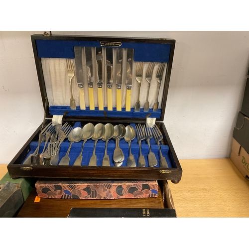 16 - Box of boxed cutlery plus Bibles etc
