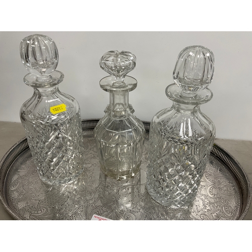 27 - 3 Vintage Cut Glass decanters On silver plated tray.