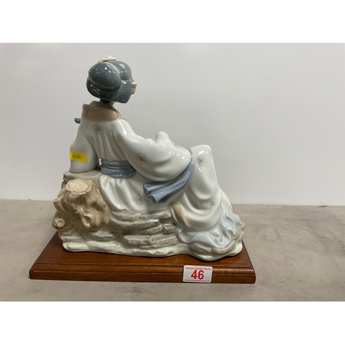 46 - NAO by Lladro ‘ Oriental Melody’ Porcelain figurine of geisha playing a Shamisen figurine on a Woode... 