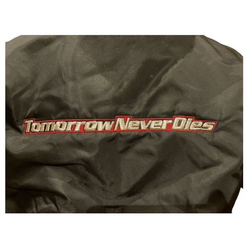 44 - An original 1997 007 James Bond Tomorrow Never Dies Cast & Crew Jacket.
Pierce Brosnan, Michelle... 