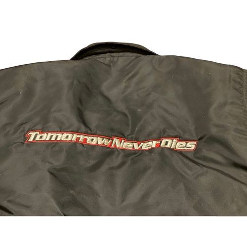 44 - An original 1997 007 James Bond Tomorrow Never Dies Cast & Crew Jacket.
Pierce Brosnan, Michelle... 