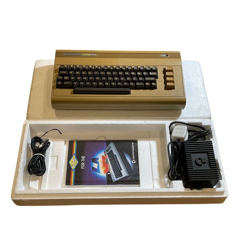 97 - A vintage 1980's Commodore 64 Micro Computer, together with a C2N Cassette Unit Gaming / Computing, ... 