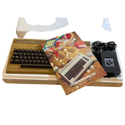 97 - A vintage 1980's Commodore 64 Micro Computer, together with a C2N Cassette Unit Gaming / Computing, ... 