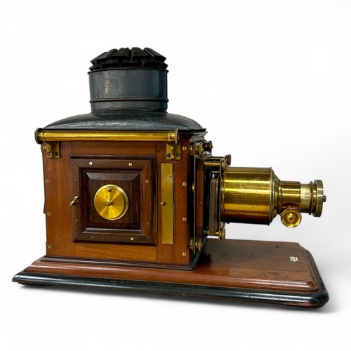 245 - A late 19th century mahogany and brass Ross Magic Lantern, the mahogany base with inset 'ROSS LONDON... 