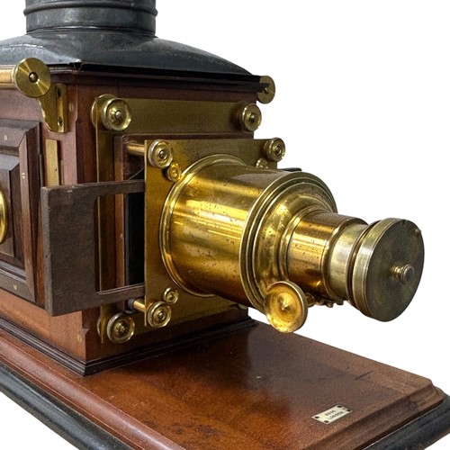 245 - A late 19th century mahogany and brass Ross Magic Lantern, the mahogany base with inset 'ROSS LONDON... 