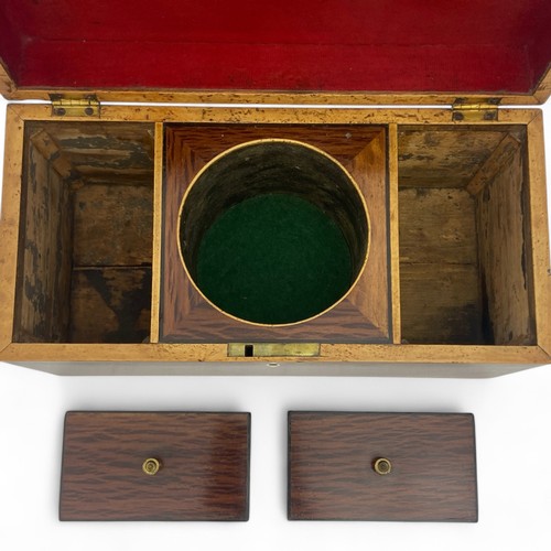 220 - A mid 19th century partridge wood double compartment tea caddy with boxwood stringing. Shield shaped... 