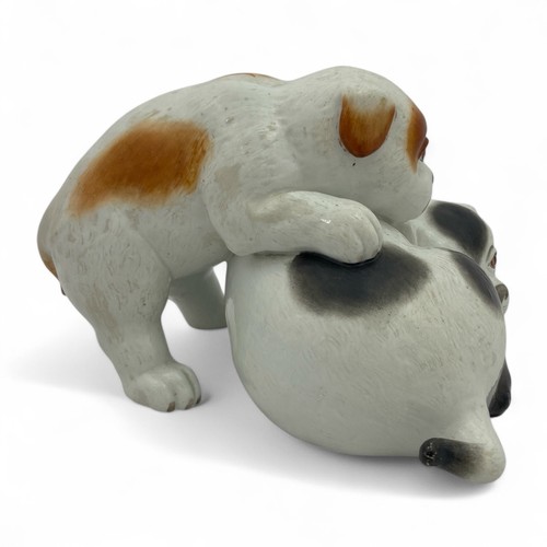 23 - A charming late 19th century Royal Worcester figural group of a pair of dogs or puppies, c1885, afte... 