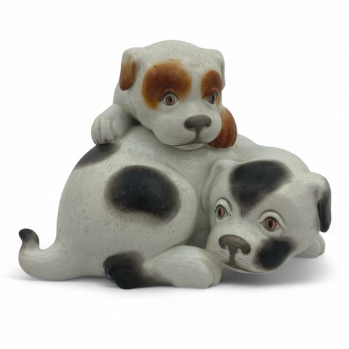 23 - A charming late 19th century Royal Worcester figural group of a pair of dogs or puppies, c1885, afte... 