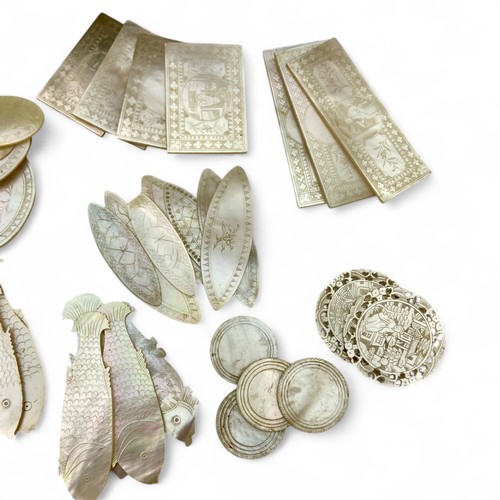 247 - A large quantity of late 19th or early 20th century Chinese etched and cut mother of pearl gaming co... 