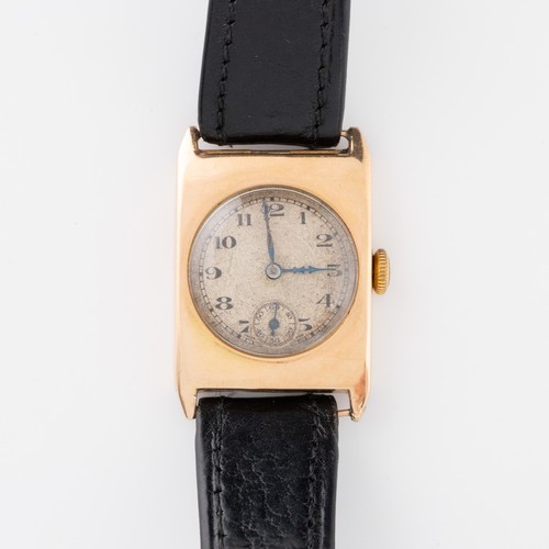 166 - An Art Deco 9ct gold cased gentleman's wristwatch, the rectangular hinged case with circular apertur... 