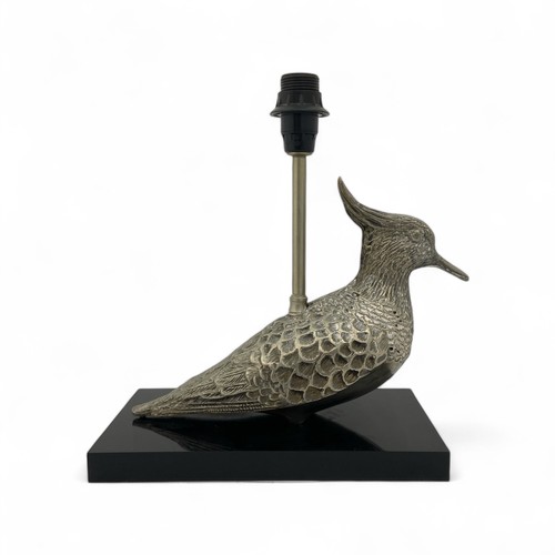 226 - A mid-late 20th century plated metal table lampbase, in the form of a Lapwing bird, mounted on a bla... 