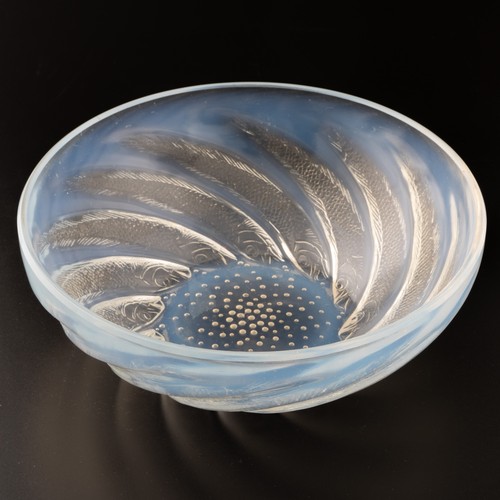 106 - A Lalique 'Poissons' pattern opalescent glass bowl, pattern number 3211 designed in 1921, the base m... 