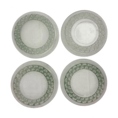 107 - Four 1930s Lalique 'Pouilly' opalescent glass dishes, three with green stain, one with remains of gr... 