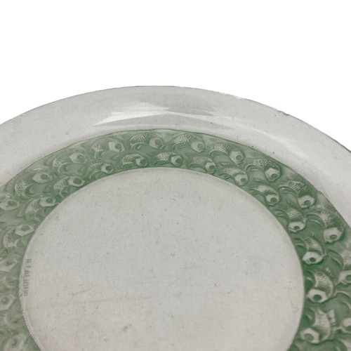 107 - Four 1930s Lalique 'Pouilly' opalescent glass dishes, three with green stain, one with remains of gr... 