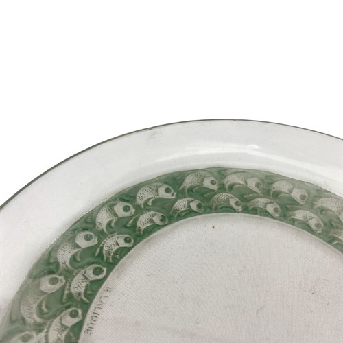 107 - Four 1930s Lalique 'Pouilly' opalescent glass dishes, three with green stain, one with remains of gr... 