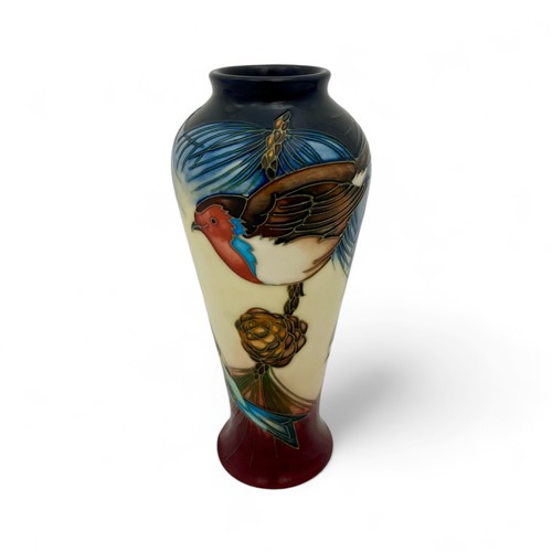 47 - A Moorcroft pottery 'Inglewood' pattern vase designed by Philip Gibson, with tube lined decoration o... 