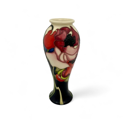 50 - A Moorcroft pottery 'Poppies' pattern limited edition vase designed by Emma Bossons in 2009, with im... 