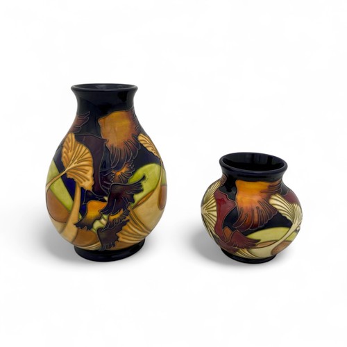 53 - Two Moorcroft pottery 'Parasol Dance' pattern vases designed by Kerry Goodwin, issued in 2006, with ... 