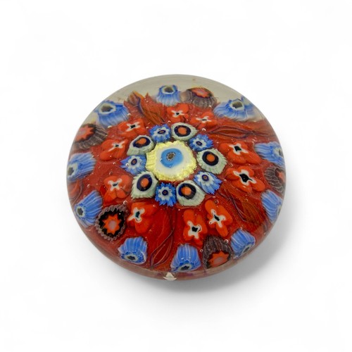 74 - Five large Strathearn P.7 millefiori dome paperweights, with orange, red, dark blue and black ground... 