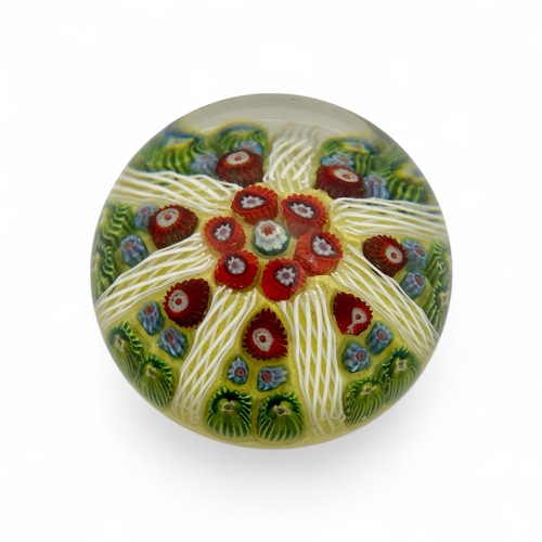 72 - Four medium Strathearn P.8 millefiori dome paperweights, with yellow green and orange grounds, diame... 