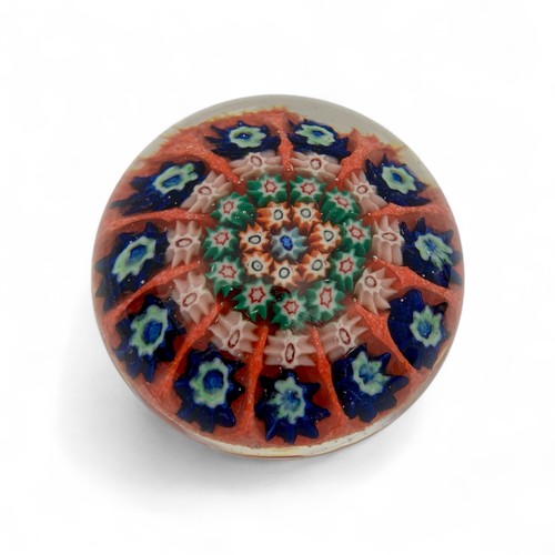 72 - Four medium Strathearn P.8 millefiori dome paperweights, with yellow green and orange grounds, diame... 