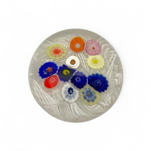 71 - Four Strathearn medium paperweights, spaced millefiori canes on lace ground, largest 7.3cm diameter ... 