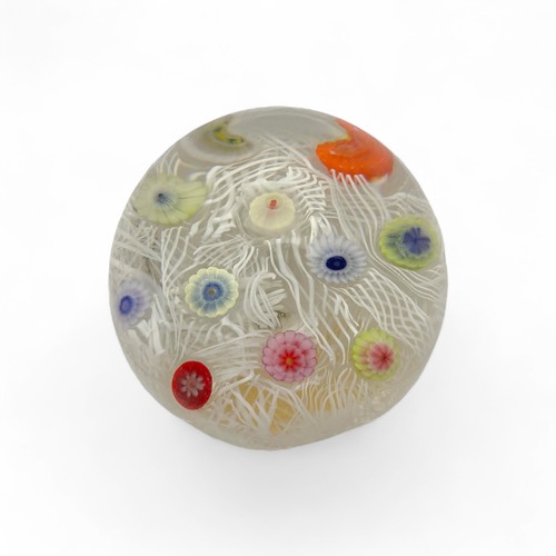 71 - Four Strathearn medium paperweights, spaced millefiori canes on lace ground, largest 7.3cm diameter ... 