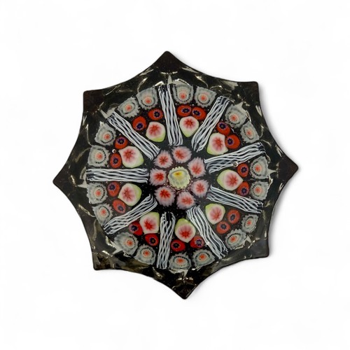 69 - Three large Strathearn nine spoke radial star moulded millefiori paperweights, with black, blue and ... 