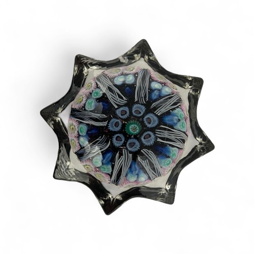 70 - Four medium Strathearn radial star moulded radial millefiori paperweights, one nine spoke and three ... 