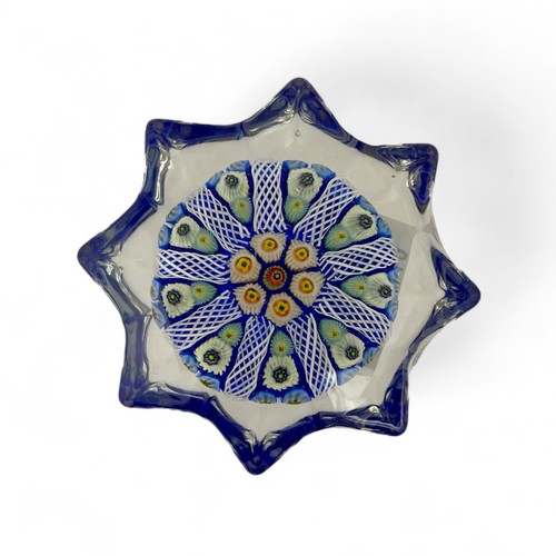 70 - Four medium Strathearn radial star moulded radial millefiori paperweights, one nine spoke and three ... 