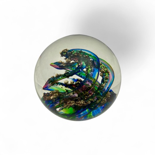 91 - Five large Selkirk Glass paperweights made by Peter Holmes, in various spiralling swirls and floatin... 