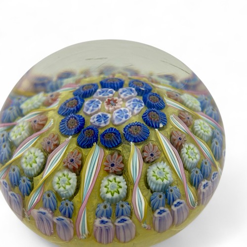 82 - Three Perthshire PP1 twelve spoke radial millefiori dome paperweights, diameter 7.6cm by 5.6cm. (3)