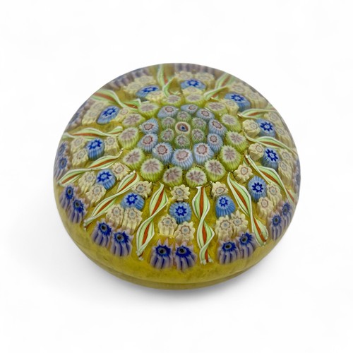 82 - Three Perthshire PP1 twelve spoke radial millefiori dome paperweights, diameter 7.6cm by 5.6cm. (3)