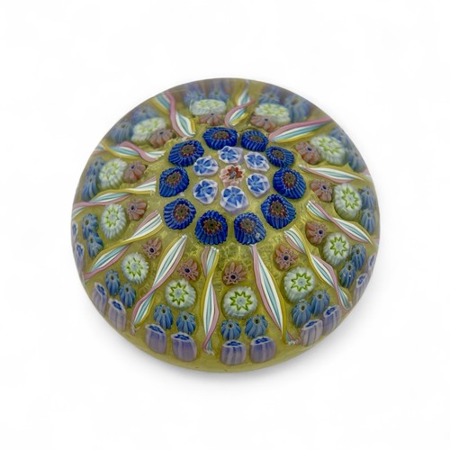 82 - Three Perthshire PP1 twelve spoke radial millefiori dome paperweights, diameter 7.6cm by 5.6cm. (3)