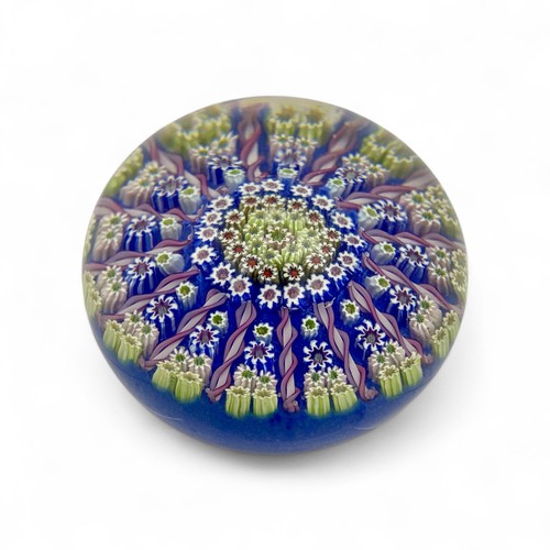 84 - Three Perthshire PP1 fourteen spoke millefiori radial paperweights, largest diameter 7.8cm by 6cm he... 