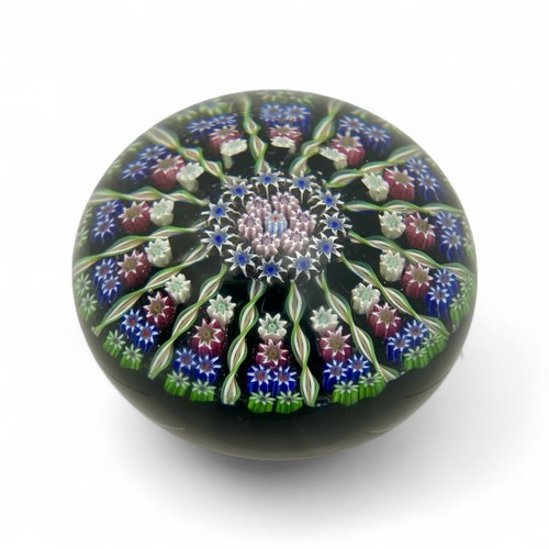 84 - Three Perthshire PP1 fourteen spoke millefiori radial paperweights, largest diameter 7.8cm by 6cm he... 