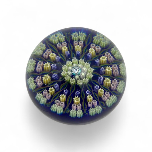 84 - Three Perthshire PP1 fourteen spoke millefiori radial paperweights, largest diameter 7.8cm by 6cm he... 