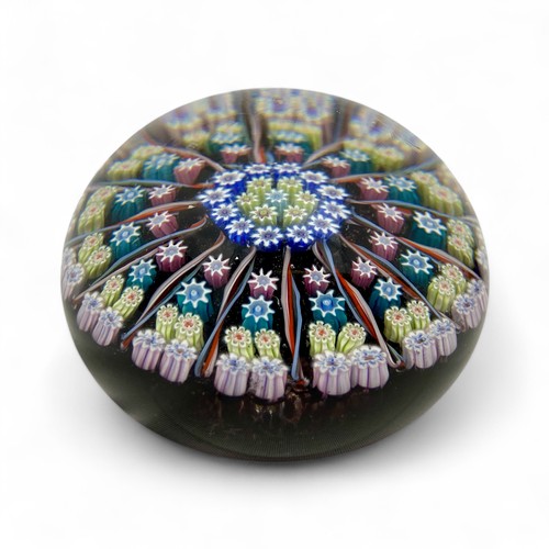 83 - Three Perthshire PP1 fourteen spoke millefiori radial paperweights, largest diameter 7.8cm by 6cm he... 